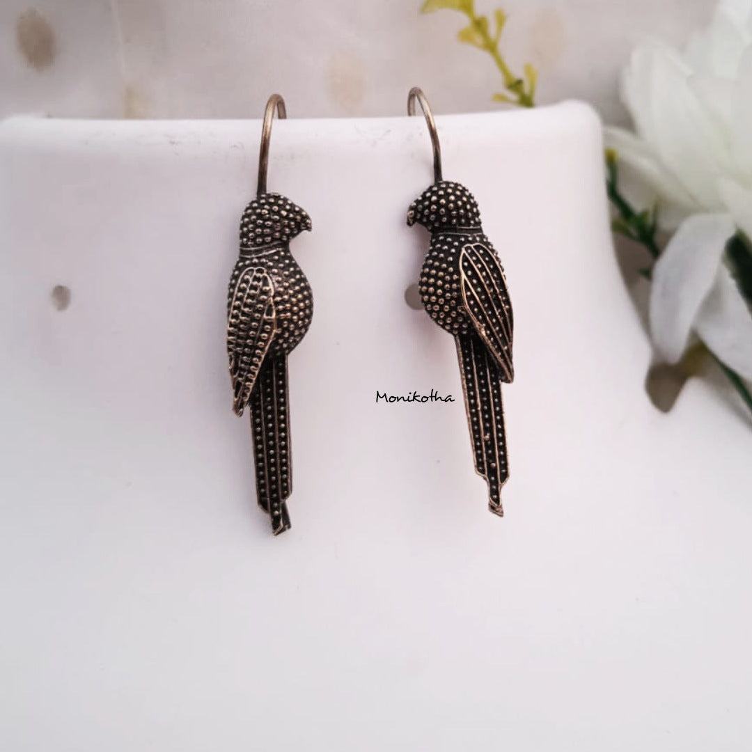 Saanvi Lustrous Silver Bird Earrings